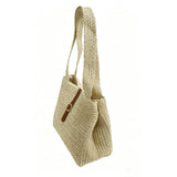 Simple and practical leather buckle woven shoulder bag; versatile straw tote bag for summer vacations.