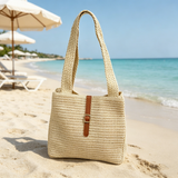 Simple and practical leather buckle woven shoulder bag; versatile straw tote bag for summer vacations.